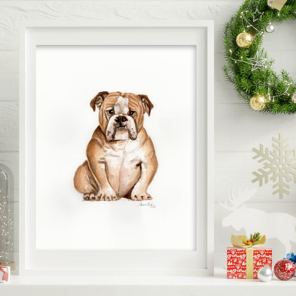 Watercolor painting of a tan bulldog in a white frame.