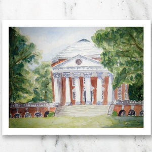 Watercolor print of University of Virginia Rotunda on marble table top