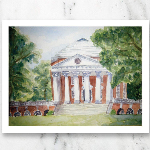 Watercolor print of University of Virginia Rotunda on marble table top